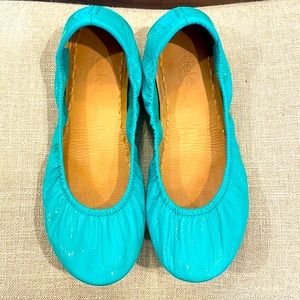 Turquoise patent leather Tieks.